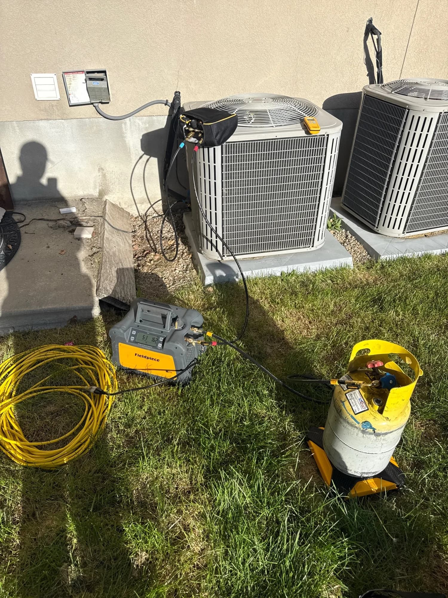 Citizen HVAC diagnostic equipment hooked up during a service call